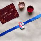3D unicorn rakhi for kids with roli chawal and rakshbandhan card 