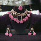 baby pink flower jewellery set - lifestyle image