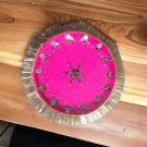 mirror work pink decorative stainless steel thali placed on table