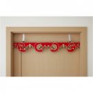 red foldable wooden toran hanging on ivory door of entrance