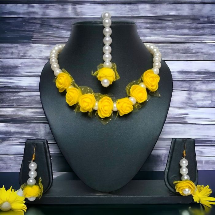 simple yellow flower jewellery for haldi on dummy