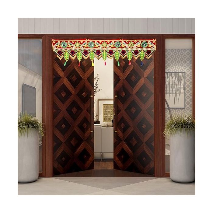 embroidered kachhi work toran hanging on entrance door 