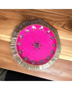 mirror work pink decorative stainless steel thali placed on table