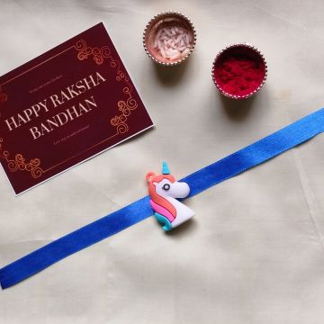 3D unicorn rakhi for kids with roli chawal and rakshbandhan card 