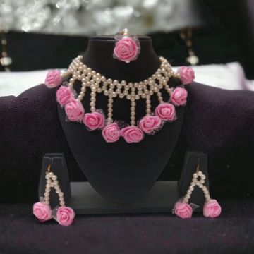 baby pink flower jewellery set - lifestyle image