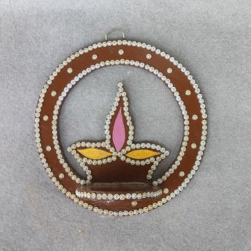 brown colored diya shaped wall mounted diya stand 