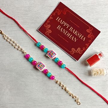 Vibrant Pink & Blue Meenakari Rakhi Set for Brother & Bhabhi