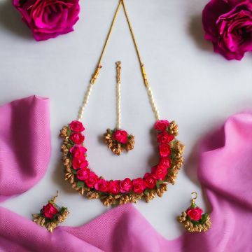 pink flower jewellery set - lifestyle image